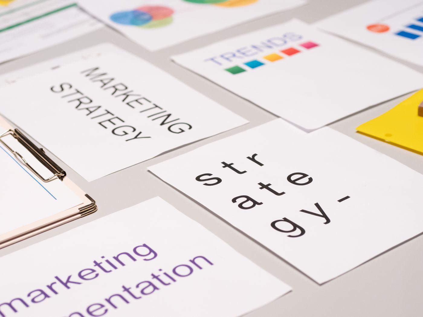 Strategy documents and trend analysis on a desk